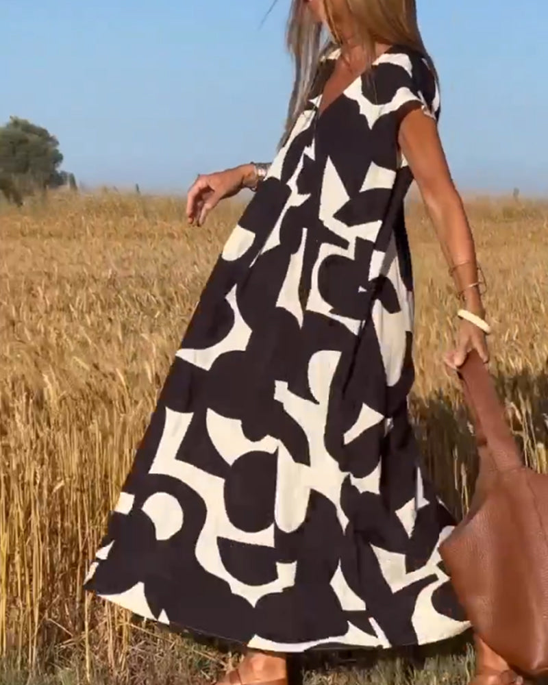 SITA™ | Elegant Dress with Print and V-Neck